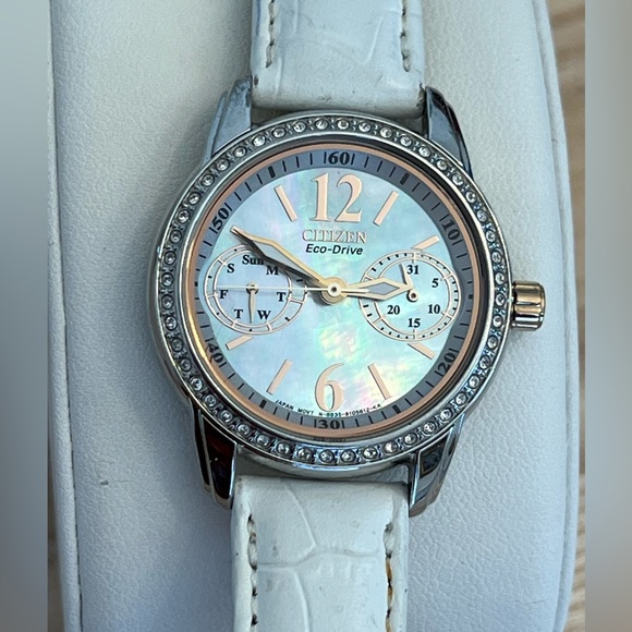 Citizen Eco-Drive Ladies Watch Crystals Pearl Dial Day/Date Stainless Case